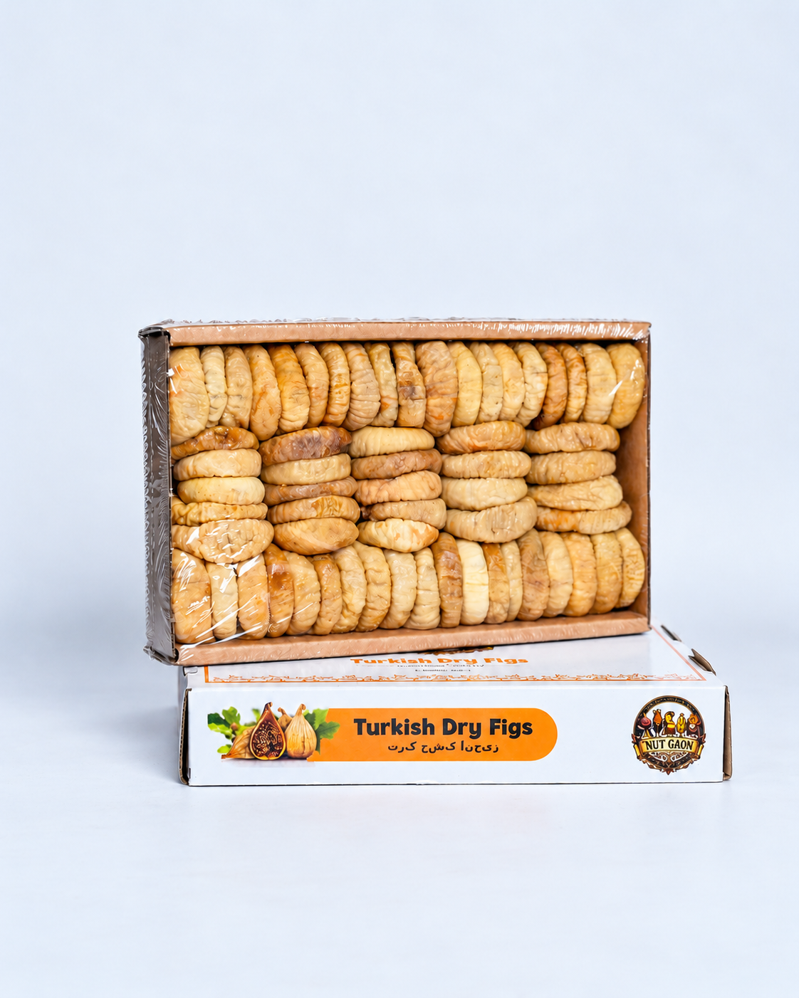 Nutgaon Turkish dry figs tray and box on a bright pale gray background